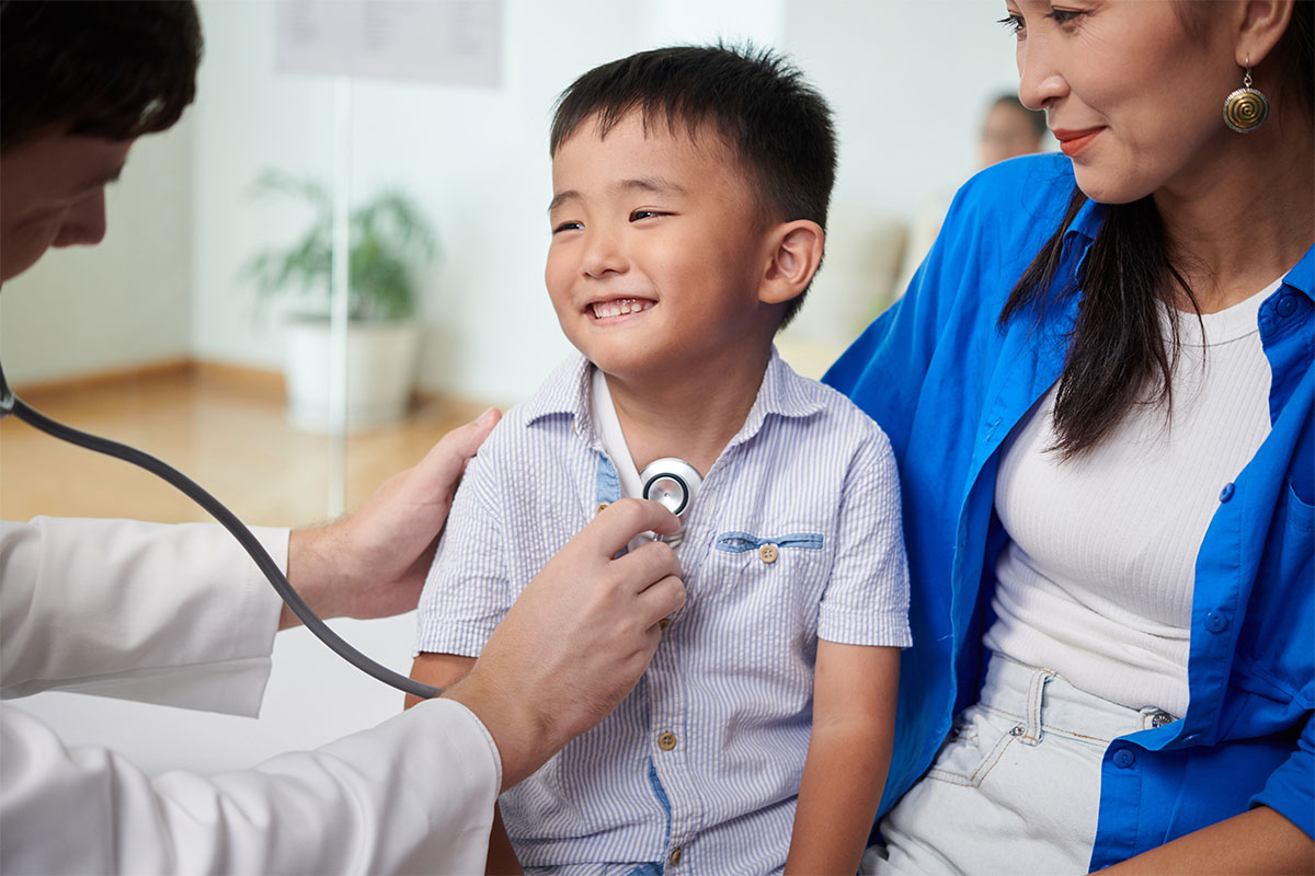 child with a doctor in NYC receiving a consultation for pediatric plastic surgery