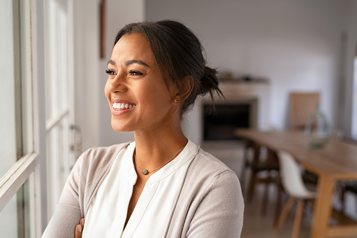 woman smiling after her lap flap breast reconstruction in NYC